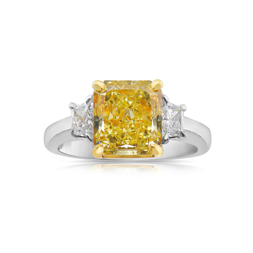 Fancy yellow diamond ring. Yellow diamond engagement ring. Canary diamond ring. Cushion cut engagement ring. Fancy yellow diamond. Yellow diamond 3 stone ring. Fancy yellow. Cushion diamond ring.