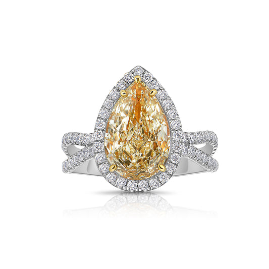 3 Carat Yellow Diamond Pear Shape Engagement Ring with Split Shank Band and diamond halo.
