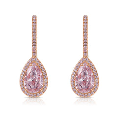 Handmade rose gold earrings featuring a rare matched pair of 2 carat each light pink pear shape diamonds and round pink diamonds