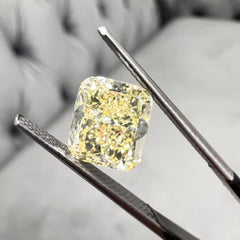 Fancy yellow diamond cushion. Yellow diamond cushion cut. Cushion canary diamond.