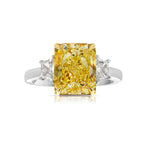 Fancy intense yellow elongated radiant diamond ring. Fancy intense yellow long radiant. Fancy intense yellow rectangular radiant