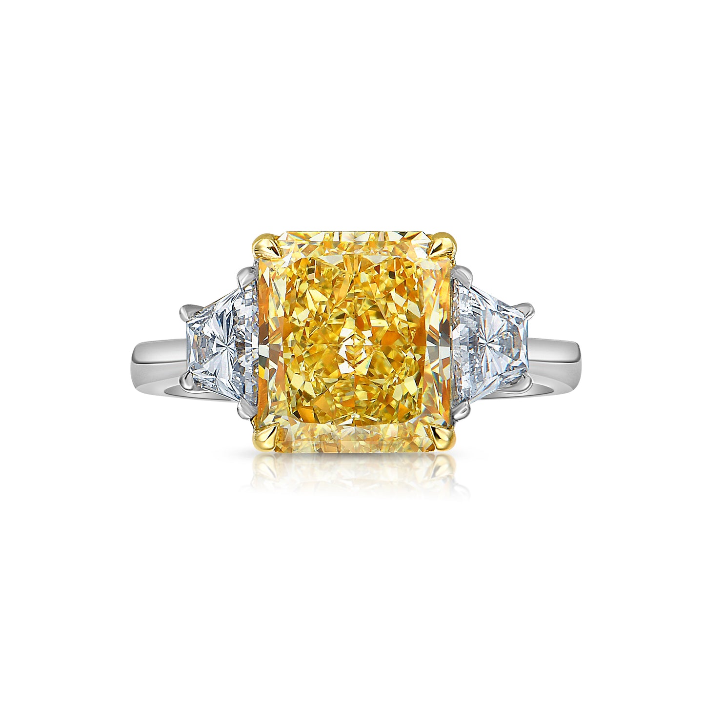 fancy yellow diamond ring. 3 carat yellow diamond. Elongated radiant. long radiant yellow diamond. yellow diamond 3 stone ring