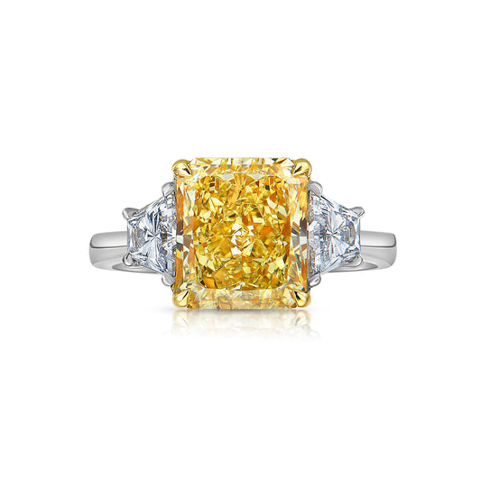 fancy yellow diamond ring. 3 carat yellow diamond. Elongated radiant. long radiant yellow diamond. yellow diamond 3 stone ring