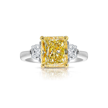 Unique 3 carat yellow diamond. yellow diamond ring. yellow diamond 3 stone ring. yellow diamond radiant cut. fancy yellow diamond. Buy yellow diamonds.