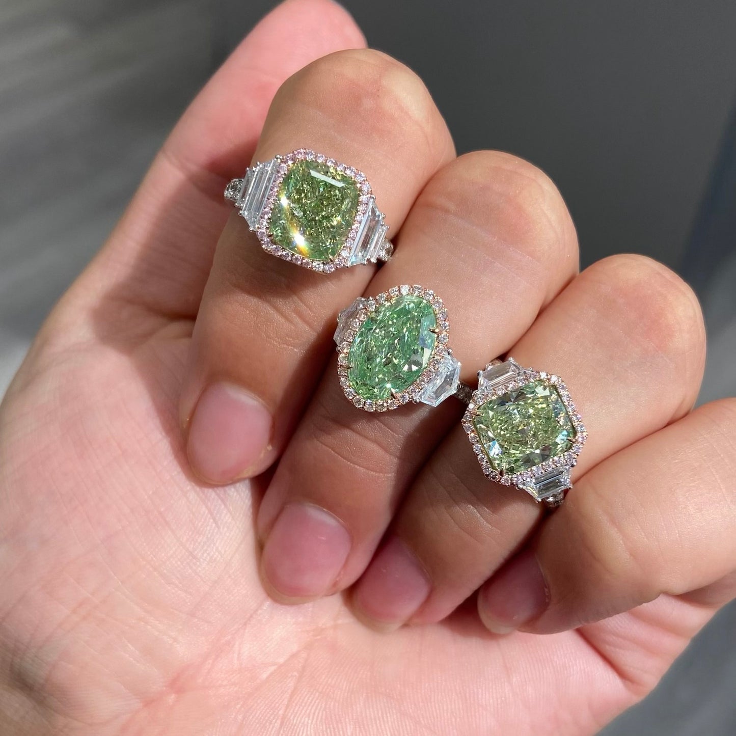 3.13 Carat GIA Green Diamond Ring with white step cut diamond side stones
