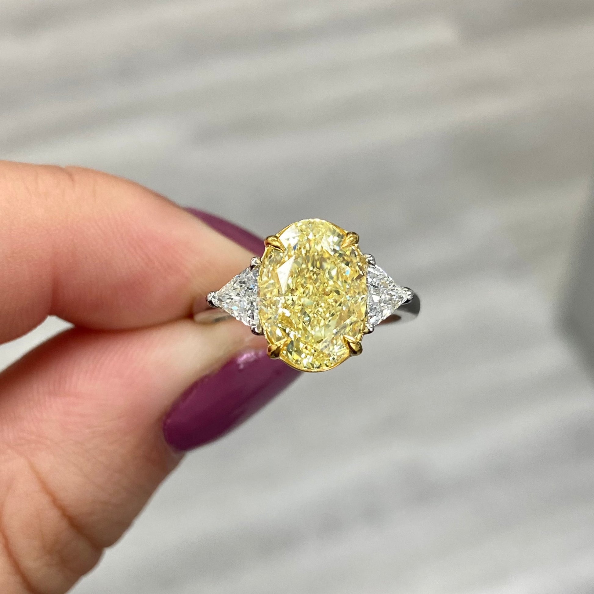 Fancy yellow diamond ring. Yellow diamond engagement ring. Canary diamond ring. Oval engagement ring. Fancy yellow diamond. Yellow diamond 3 stone ring. Fancy yellow. Oval diamond ring