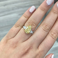 yellow diamond ring. yellow diamond pear shape. yellow diamonds. fancy yellow pear shape.