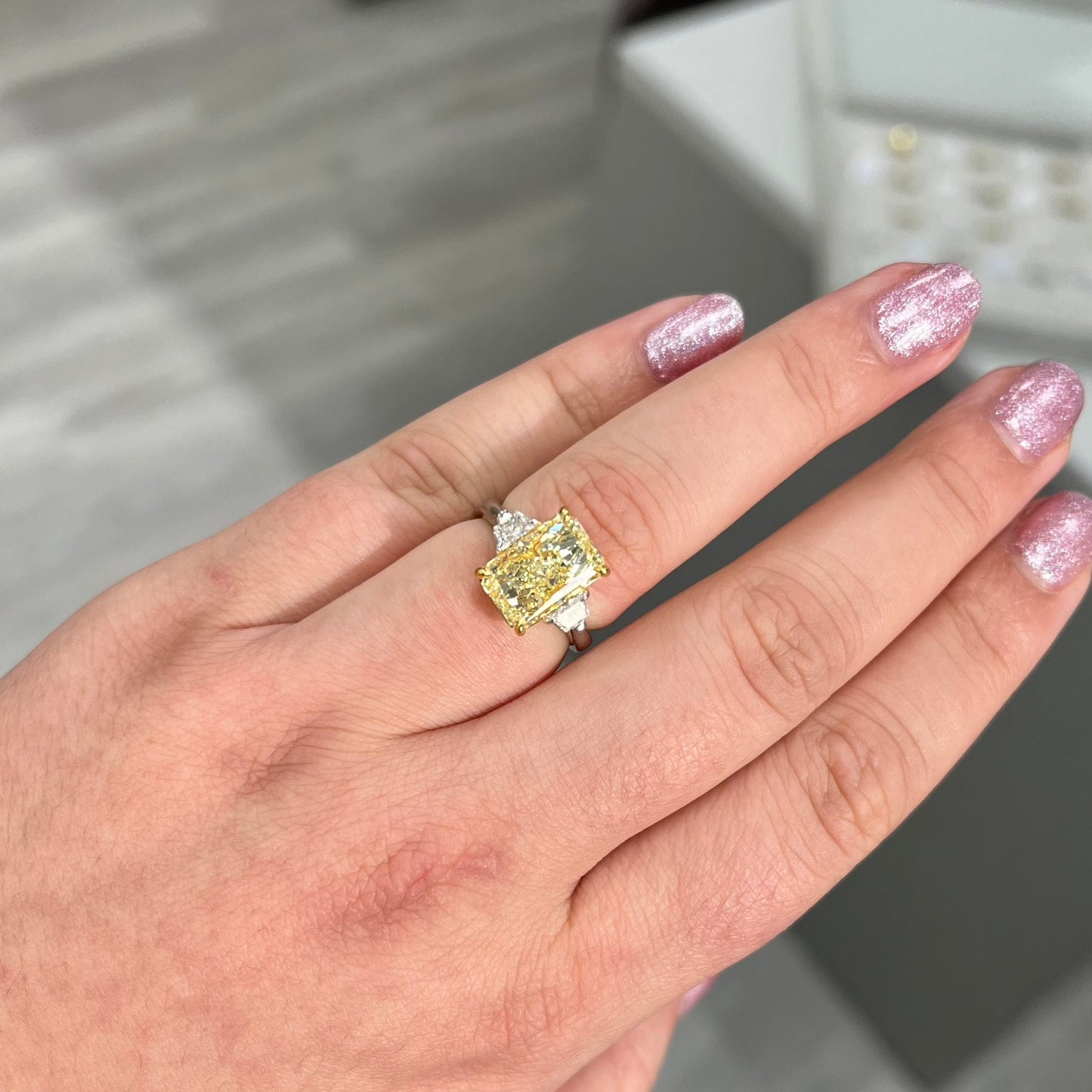 4 carat fancy yellow diamond ring. Gia certified fancy yellow diamond. Radiant cut yellow diamond. Yellow diamond engagement ring. Yellow diamond 3-stone ring. Canary diamond ring.