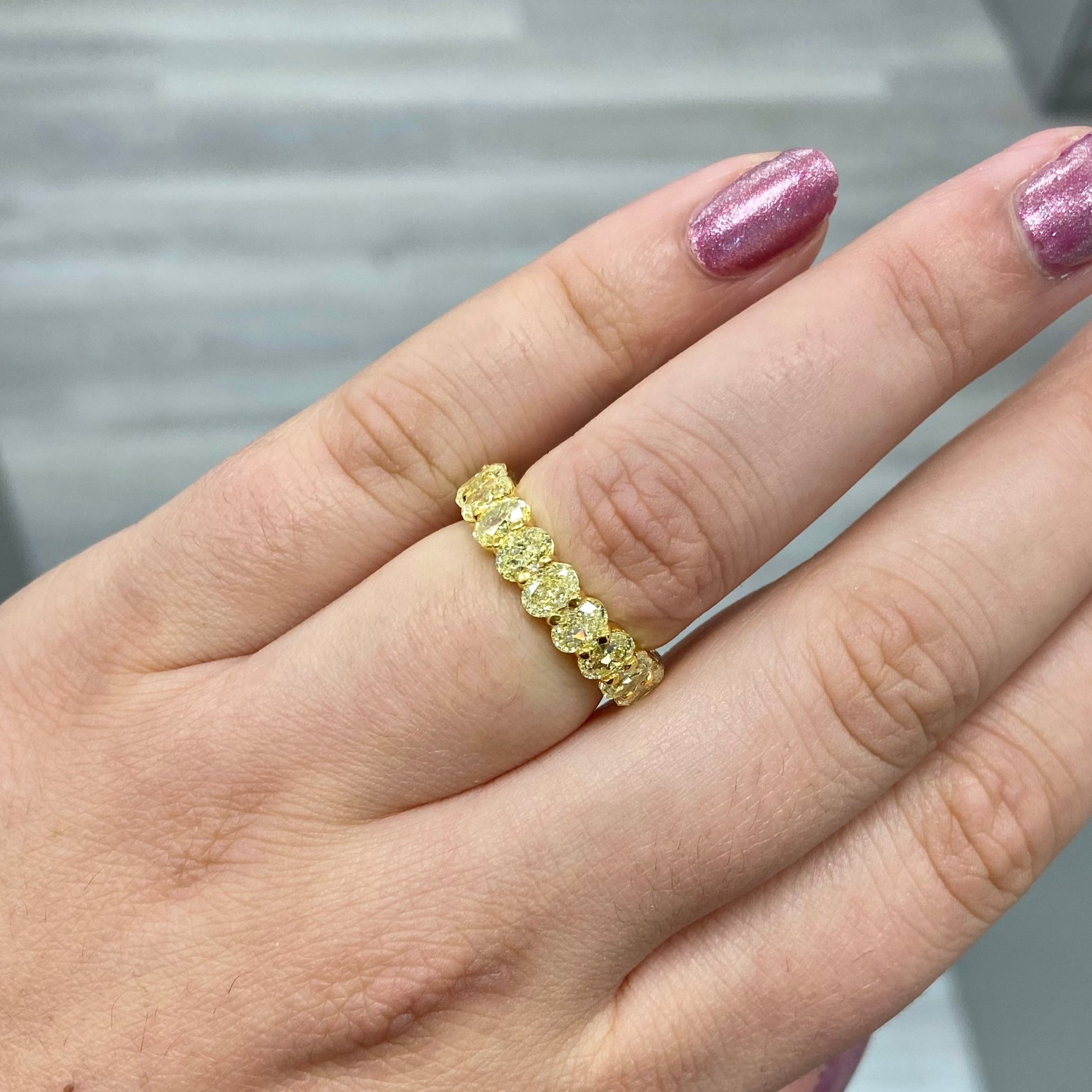 Oval diamond eternity ring. Yellow diamond oval eternity ring. Yellow diamond band. Canary diamond band. Yellow oval diamonds. Fancy yellow oval diamond ring. Yellow diamond stackable rings.