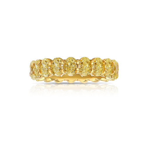 Oval diamond eternity ring. Yellow diamond oval eternity ring. Yellow diamond band. Canary diamond band. Yellow oval diamonds. Fancy yellow oval diamond ring. Yellow diamond stackable rings.