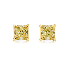 2 Carat each fancy light yellow studs earrings set in 18 karat yellow gold.Fancy light yellow diamond earrings. Yellow diamond earrings. Canary diamond earrings