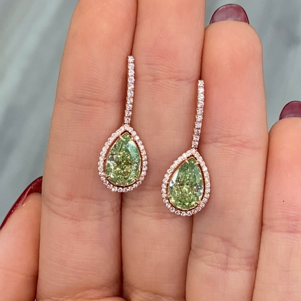 Natural green diamond earrings in a halo, diamond drop earrings with a beautiful green color