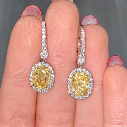 oval diamond earrings. yellow diamond oval earrings. yellow diamond ovals. yellow diamond earrings.