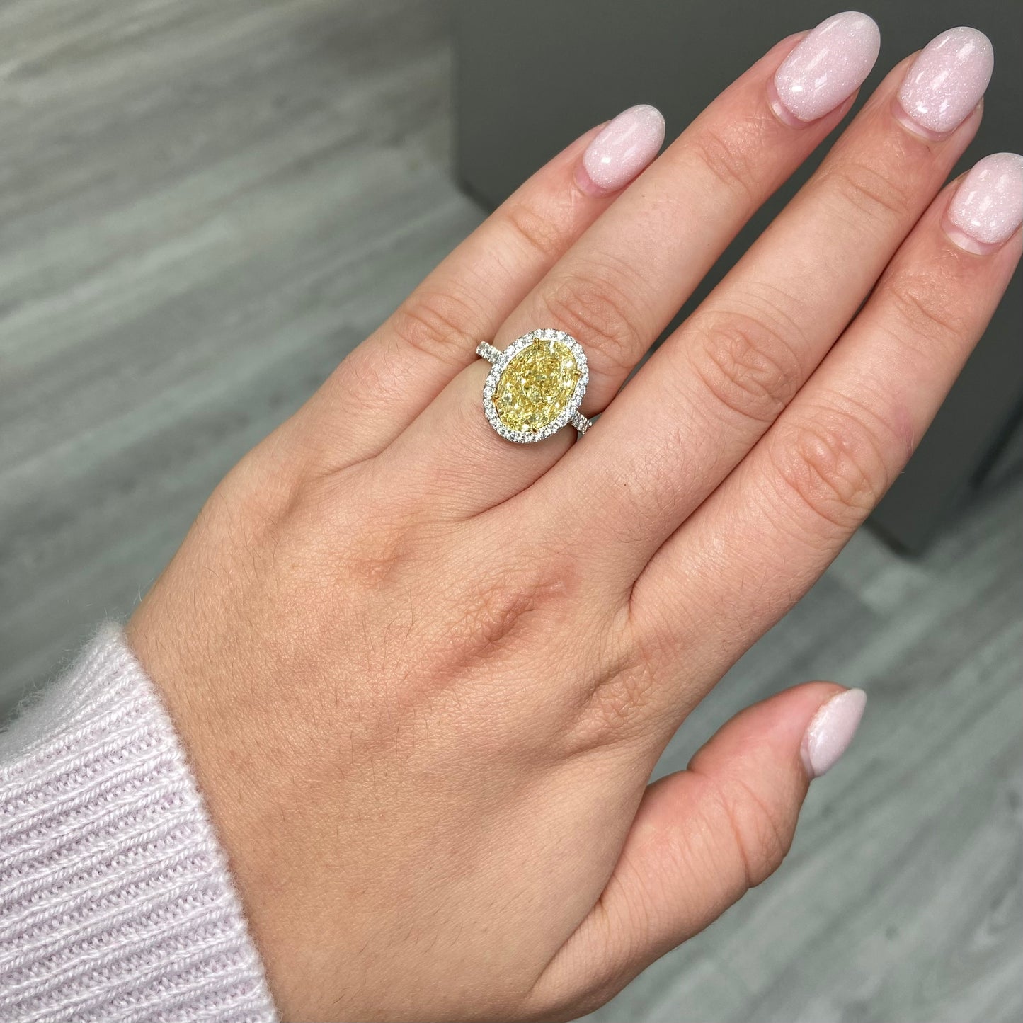 6 carat fancy light yellow diamond oval halo ring