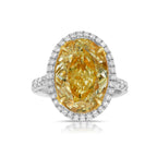6 carat fancy light yellow diamond oval halo ring, yellow diamond engagement ring.