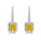 Yellow diamond drop earrings, diamond earrings, natural yellow diamonds, canary yellow diamonds, halo diamond earrings, yellow diamond earrings with diamond halo.