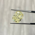 fancy light yellow diamond. fancy yellow diamond. long cushion cut. long yellow cushion cut. 7 carat yellow diamond. buy yellow diamond.