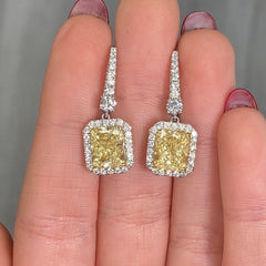 yellow diamond earrings. yellow diamond drop earrings. GIA yellow diamond earrings. radiant cut yellow diamonds. yellow diamond jewelry.