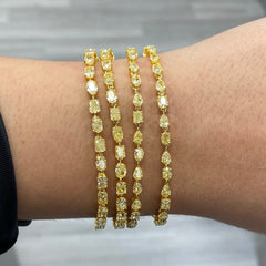 Fancy intense yellow diamond bracelet. Yellow diamond multi shape bracelet. Yellow diamond tennis bracelet. Canary diamond bracelet. Yellow diamond mutl shape. Natural yellow diamond bracelet