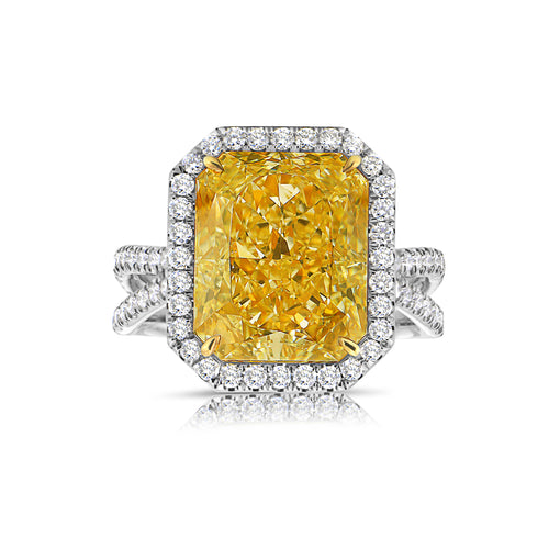 9 carat yellow diamond ring. Diamond ring set with a halo. Yellow diamond engagement ring. Yellow diamond wedding ring. Yellow diamond radiant. Yellow diamond ring.