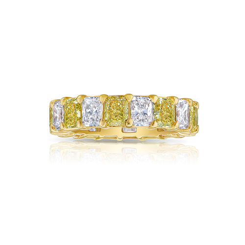 Alternating yellow and white diamond eternity band. Elongated radiant cut. Long radiant cut. Fancy yellow long radiants. Long white diamond radiants. Eternity band. Yellow diamond eternity band. Yellow diamond ring.