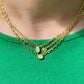 Canary diamond necklace, yellow heart shape diamond on a golden chain, bezel set yellow diamond