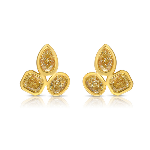 Celebrity style unique earrings with pear, radiant, and oval cut diamonds.