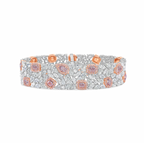 GIA certified light pink cushion and pear shape diamonds with white diamond bracelet.