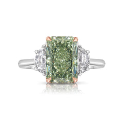 Natural green diamond engagement ring with a radiant cut center and yellow diamond accents.