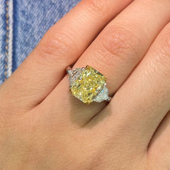 A unique GIA certified ring with Elongated fancy yellow diamond ring.