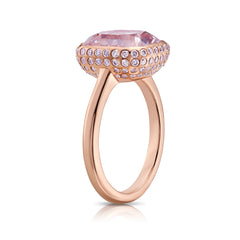 Elegant bezel set ring featuring a GIA certified very light pink cushion cut diamond.