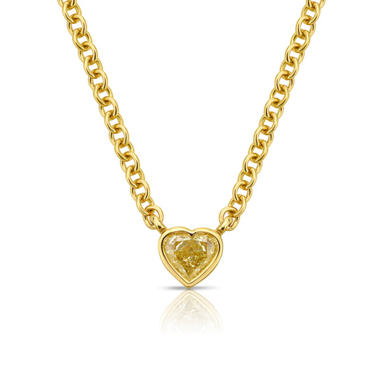 Canary diamond necklace, yellow heart shape diamond on a golden chain, bezel set yellow diamond
