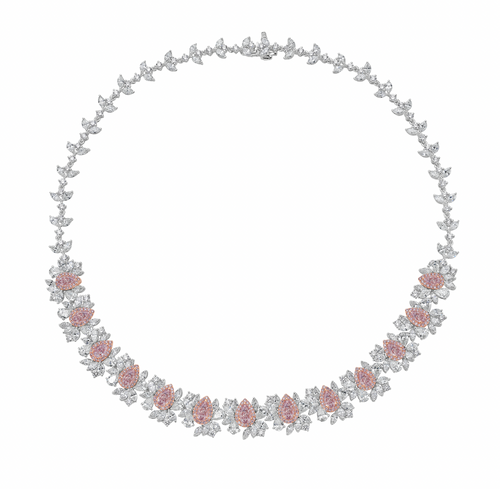 GIA certified light pink pear shape diamonds with mixed white diamonds in a stunning necklace.