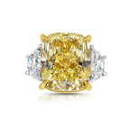 GIA certified fancy yellow cushion diamond engagement ring with elongated radiant cut center diamond and VS2 clarity.