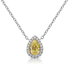 Simple yet elegant yellow diamond pedant that would compliment anyones collection. 1 Carat carat natural fancy light yellow pear shape diamond. Set in 18 karat gold with classic halo. Handmade in New York City.