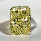 GIA certified Fancy Yellow elongated radiant cut diamond with VS2 clarity.