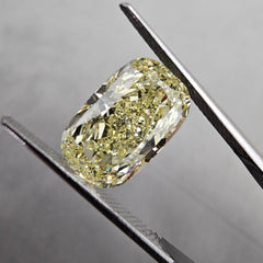 Elongated fancy yellow diamond cushion cut. Long fancy yellow diamond cushion cut. yellow diamond cushion. 5 carat fancy yellow.