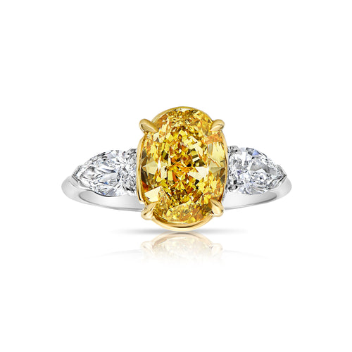 Intense oval diamond ring. Intense yellow diamond. Gia certified intense yellow diamond. Oval diamond ring. Yellow diamond engagement ring. Yellow diamond rings. Yellow diamond jewelry.