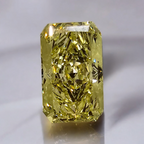 Radiant Fancy Intense Yellow diamond with a super elongated cut and remarkable VS2 clarity.