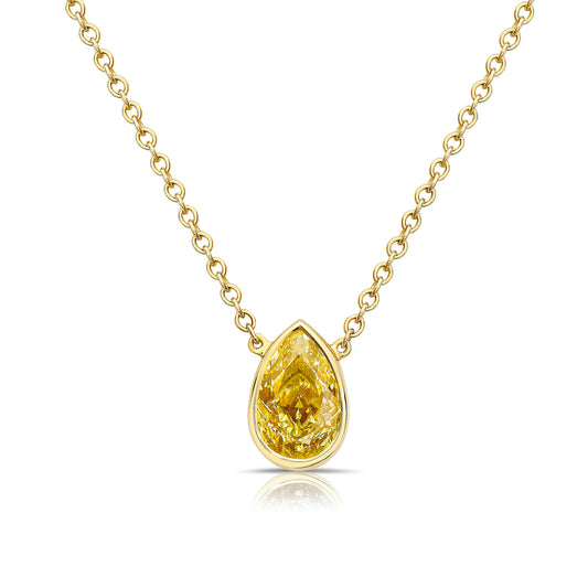 Bezel set diamond necklace. Pear diamond necklace. Simple diamond pendant. Yellow diamond pendant. Yellow diamond bezel set necklace. Everyday pear diamond pendant. Yellow diamond pear shape.
