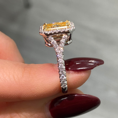 Yellow diamond ring with White Halo diamonds