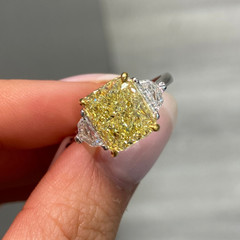 Fine Yellow diamond engagement ring featuring a GIA certified diamond.