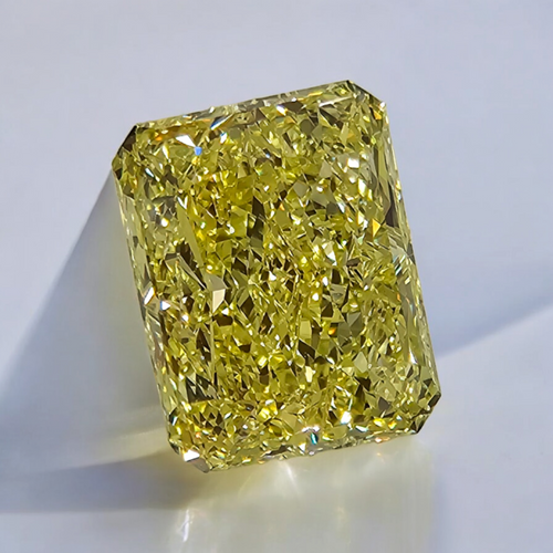 GIA certified Fancy Yellow marquise cut diamond with VS1 clarity and no fluorescence.