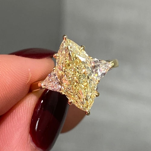 Yellow marquise cut diamond ring