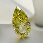 GIA certified fancy Intense Yellow pear-shaped diamond with SI1 clarity and vibrant brilliance.