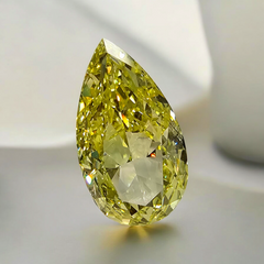 GIA certified fancy Intense Yellow pear-shaped diamond with SI1 clarity and vibrant brilliance.