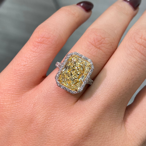 Elongated yellow diamond ring