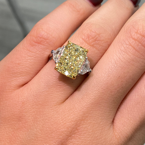 Radiant yellow diamond ring