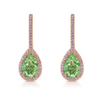 Elegant green pear-shaped diamond drop earrings in 18k rose gold, framed by a halo of white diamonds.