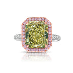 Elegant radiant cut engagement ring featuring a fancy greenish yellow elongated diamond with SI2 clarity.